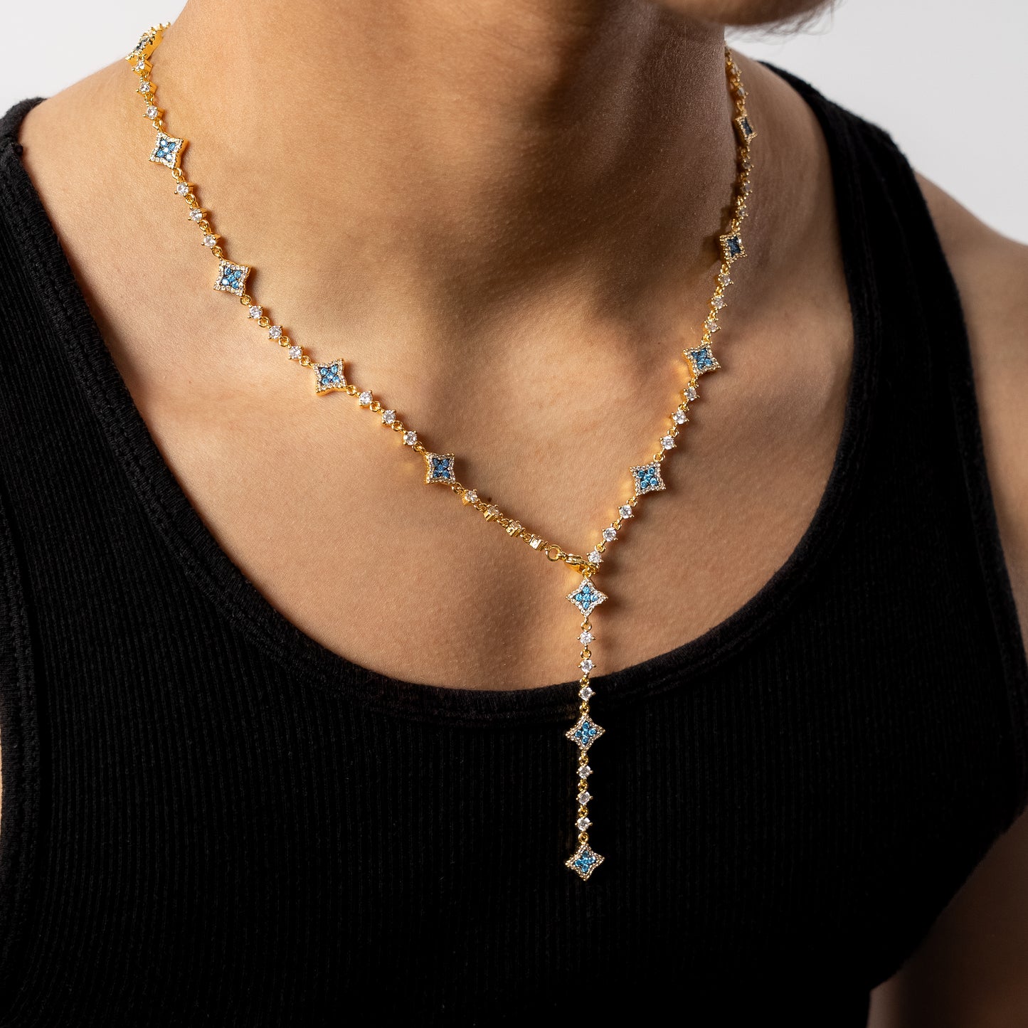 Lariat Flower Tennis Gold - Blue Stones