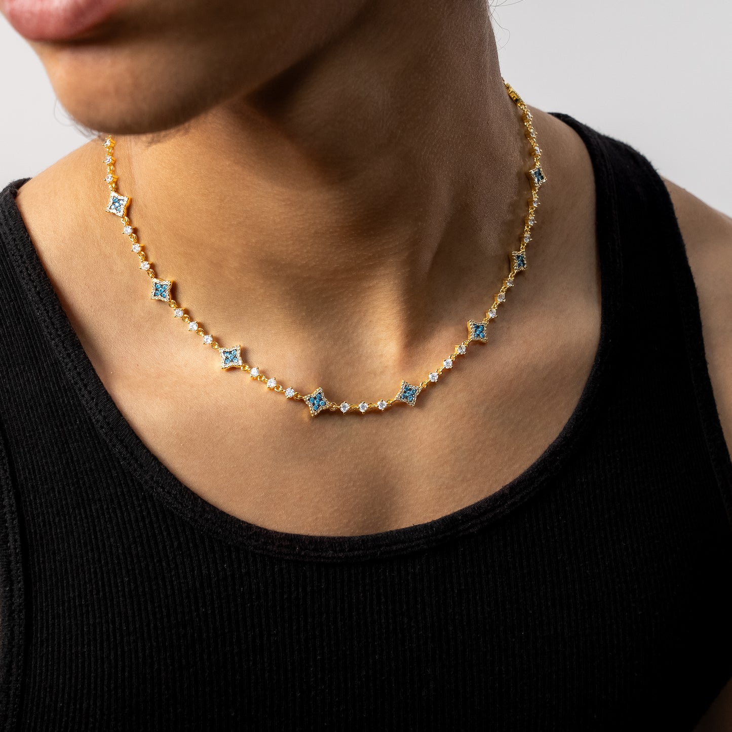 Gold Flower Tennis Chain - Blue Stones