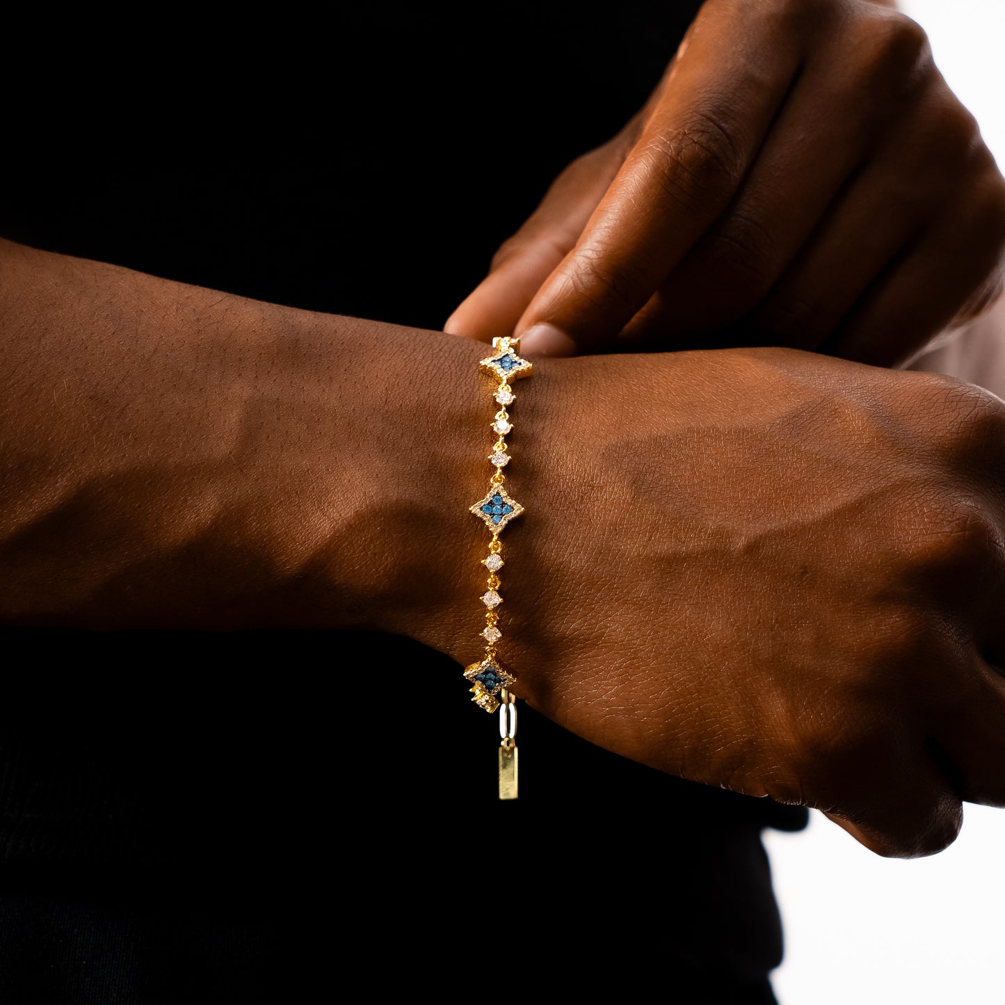 Gold Flower Tennis Bracelet - Blue Stones