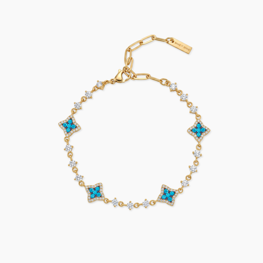 Gold Flower Tennis Bracelet - Blue Stones